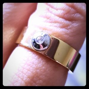 Gold tone ring with crystal